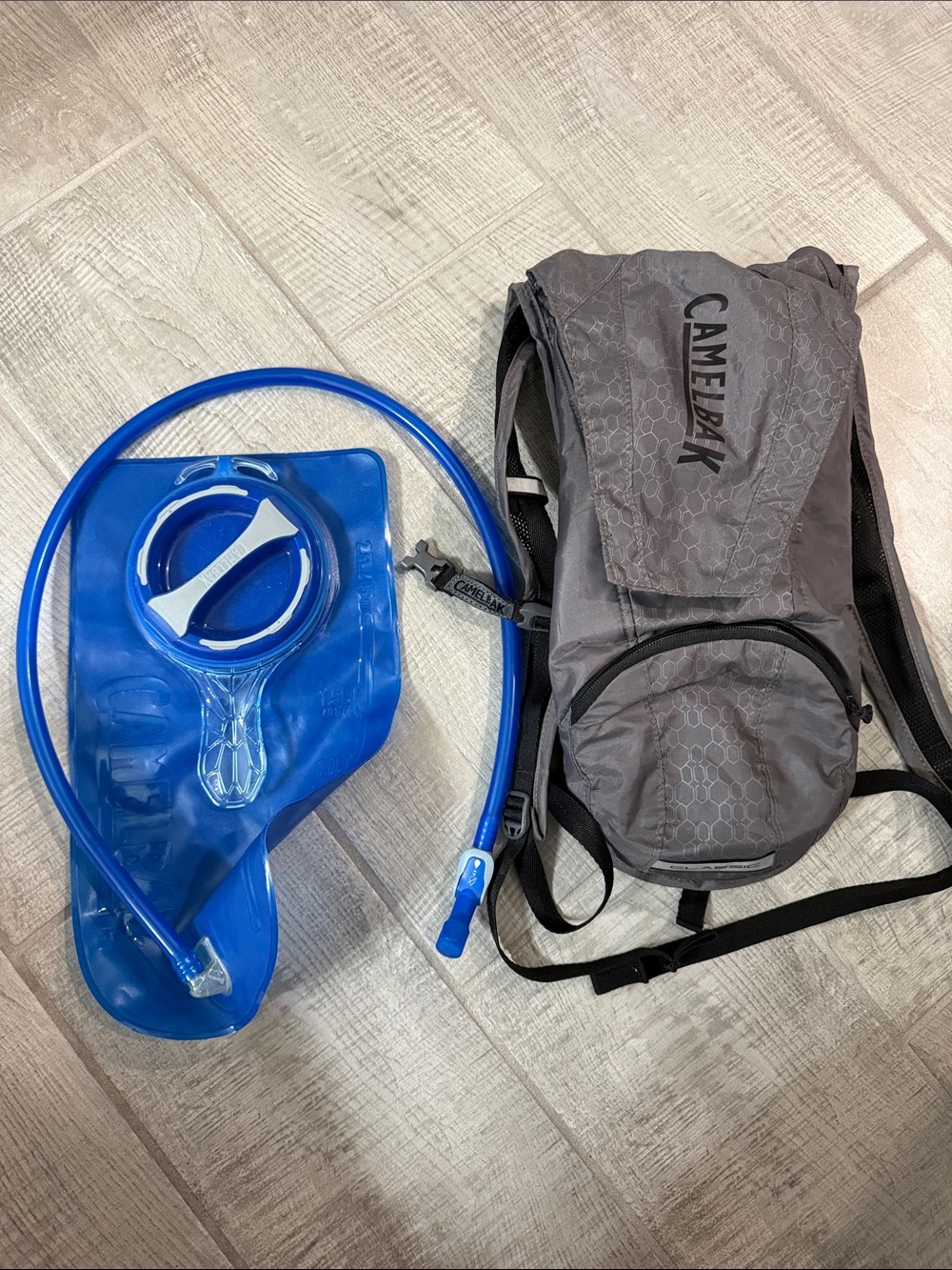 CamelBak Gray Running Backpack with Blue Hydration Bladder